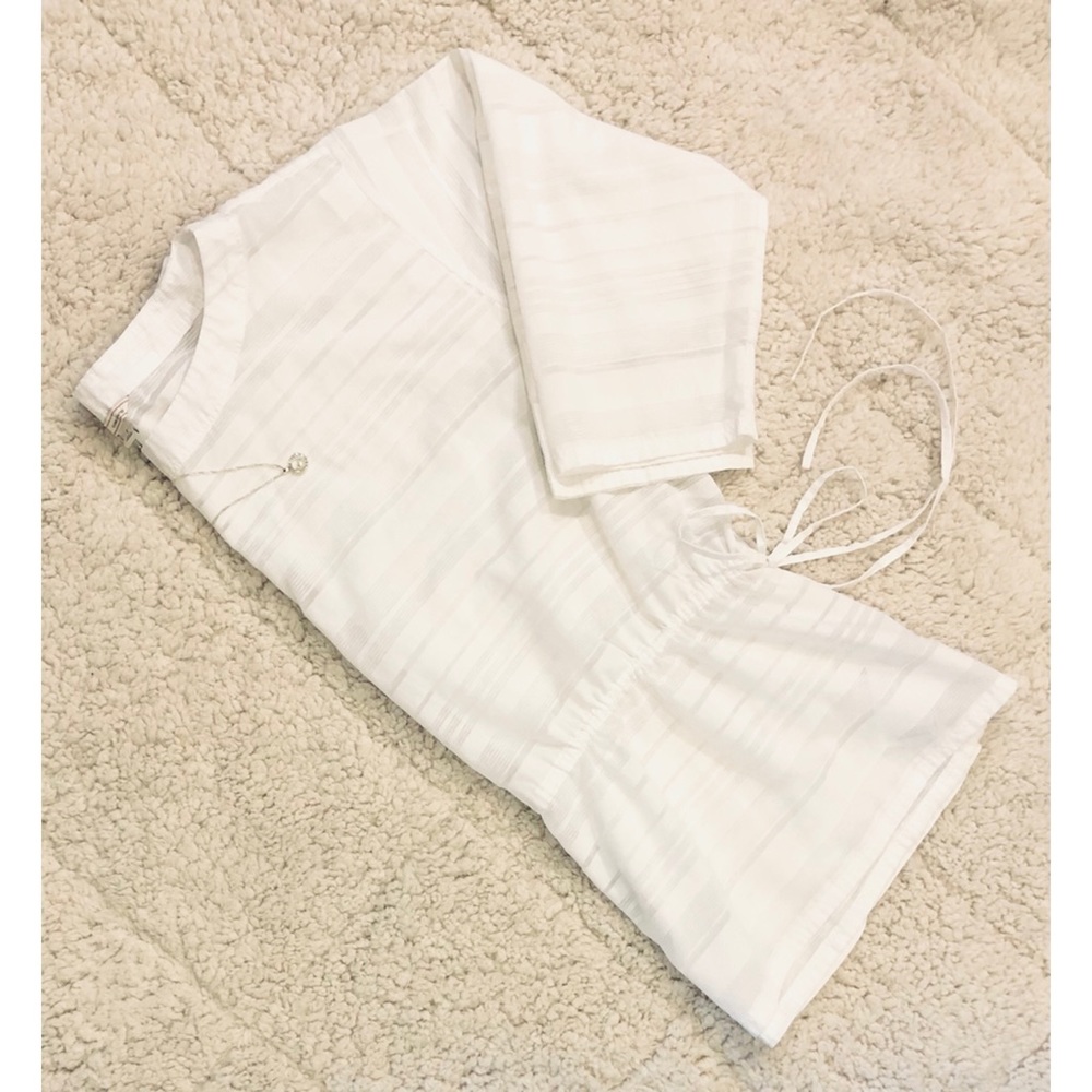 Clean white | Tied waist | See thru detail